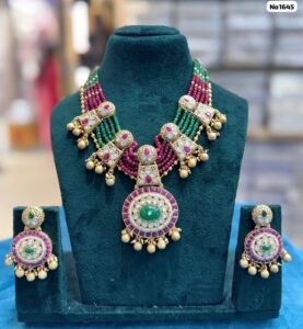 Kundan-six-layer-Green-Mroon-Choker-with-Earrings