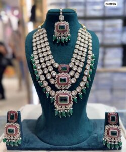 AD-Kundan-Jewelry-with-Earrings-and-Tikka-Dark-Green-Pinkish-Outlining