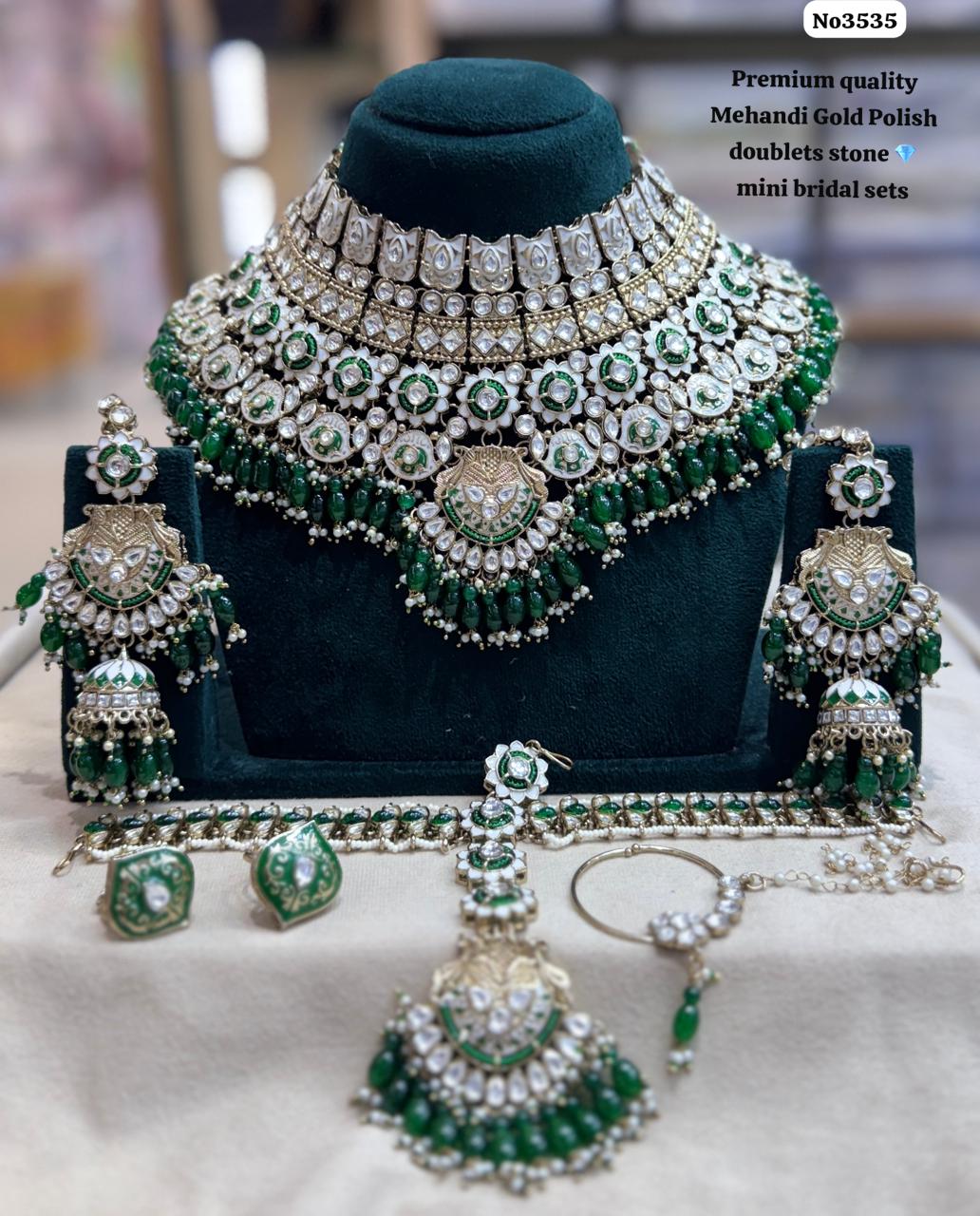 Kundan-bridal-set-with-Earrings-and-Tikka-Dark-Green