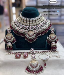 Kundan-bridal-set-with-Earrings-and-Tikka-Maroon