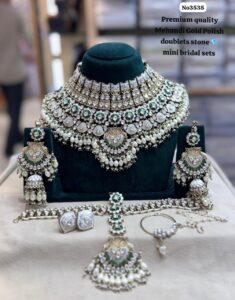 Kundan-bridal-set-with-Earrings-and-Tikka-White
